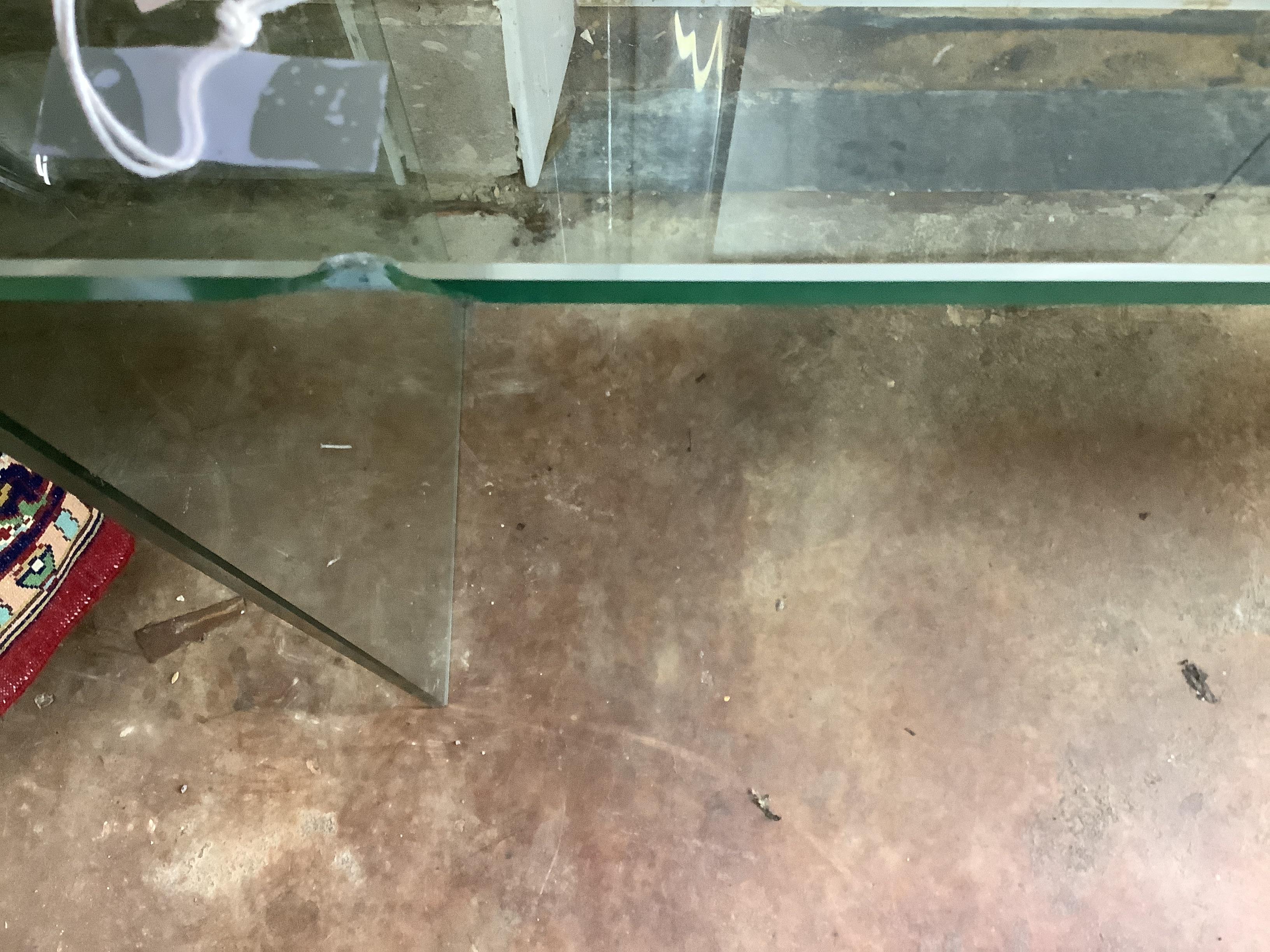 A Contemporary glass console table, width 99cm, depth 33cm, height 75cm